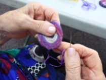 Ryl stitching some felted circles